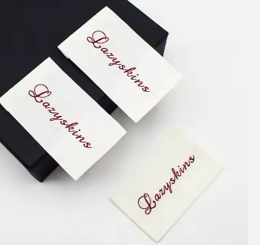 JinYi Hardware Factory OEM ODM Engraved Embossed Brand Logo Design Zinc Alloy Custom Garment Metal Label Tag JinYi Hardware Factory OEM ODM Engraved Embossed Brand Logo Design Zinc Alloy Custom Garment Metal Label Tag